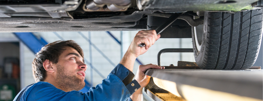 Mechanic checking a vehicle