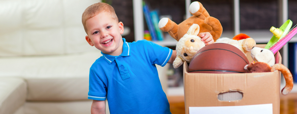 A kid donating toys