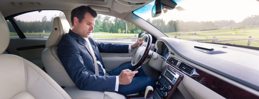 Man driving his vehicle