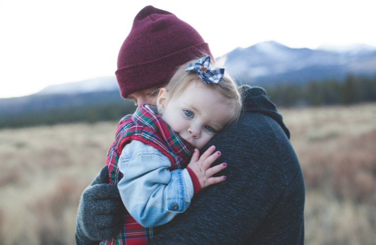 A father hugging his child
