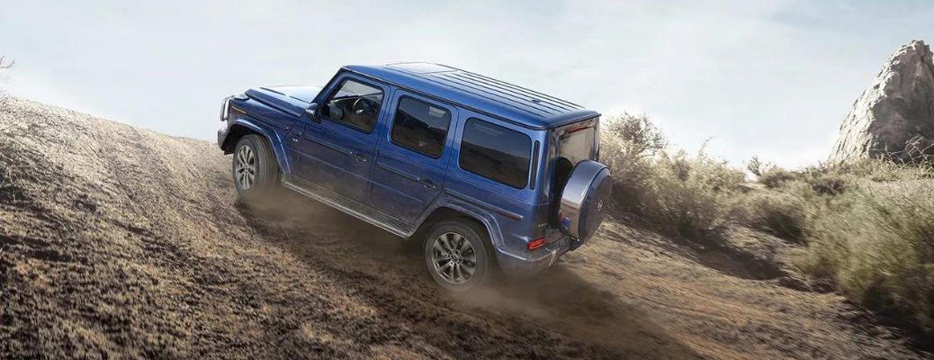 2024 Mercedes-Benz G-Class SUV in a sandy terrain