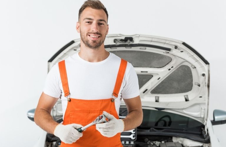 A smiling mechanic