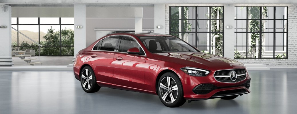 a red Mercedes-Benz C-Class sedan