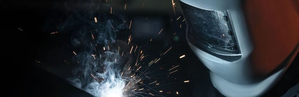 a person working in an auto repair facility