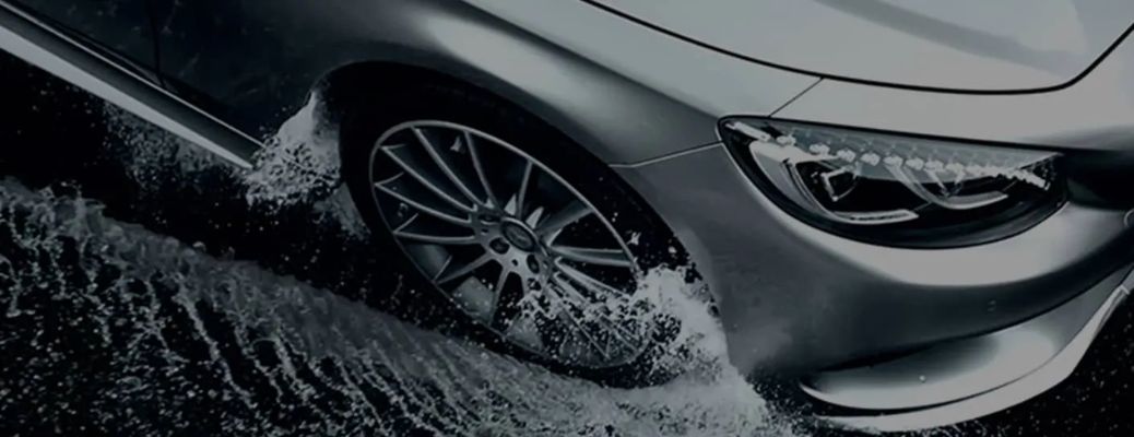 Closeup of a Mercedes-Benz vehicle navigating water