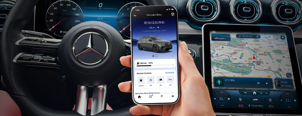 Individual using the Mercedes-Benz app along with the dashboard and steering wheel in the background
