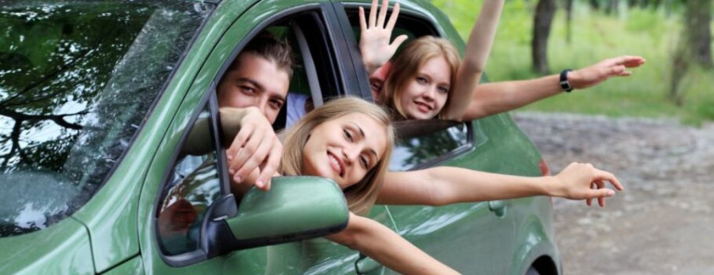 a happy family in a car