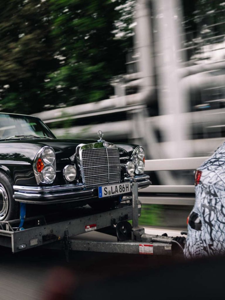 The 2026 GLC EV towing an older Mercedes