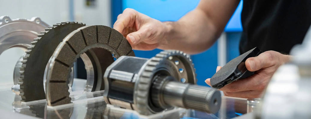 A man working on a Mercedes-Benz prototype in-line brake