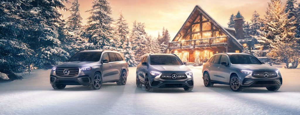 3 4MATICĀ®-equipped vehicles in a snowy winter scene