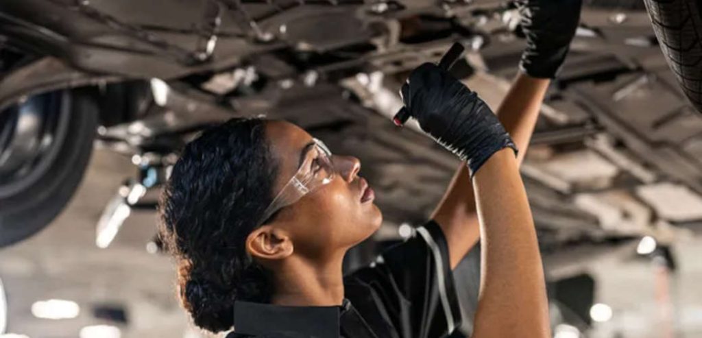 A woman performing Mercedes-Benz Service A vs. Service B