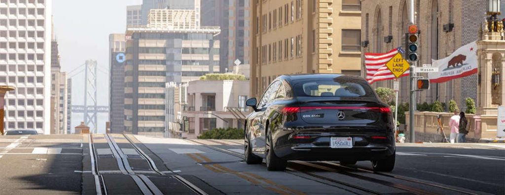 The Mercedes-Benz EQS, which is capable of using the NACS adapter for charging