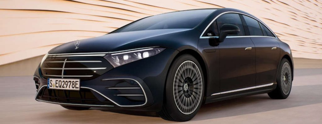 The 2026 Mercedes-Benz EQS Sedan driving in the desert heat