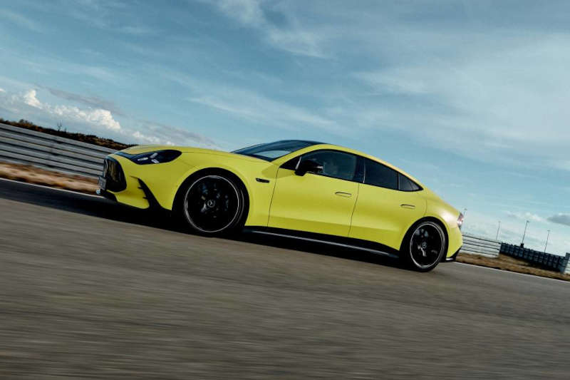 A side external view of the 2027 Mercedes-AMG® 4-door Coupe on the race track