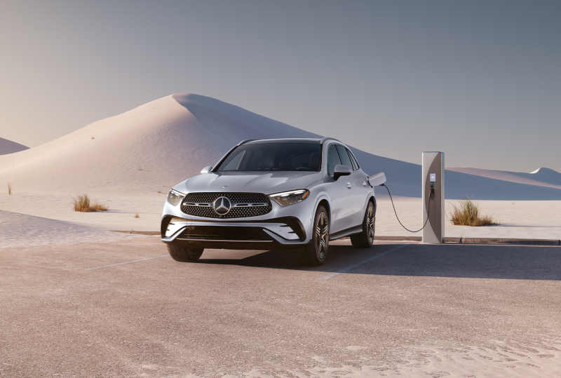 An exterior view of the 2027 GLC 350e Plug-In Hybrid at a charging station