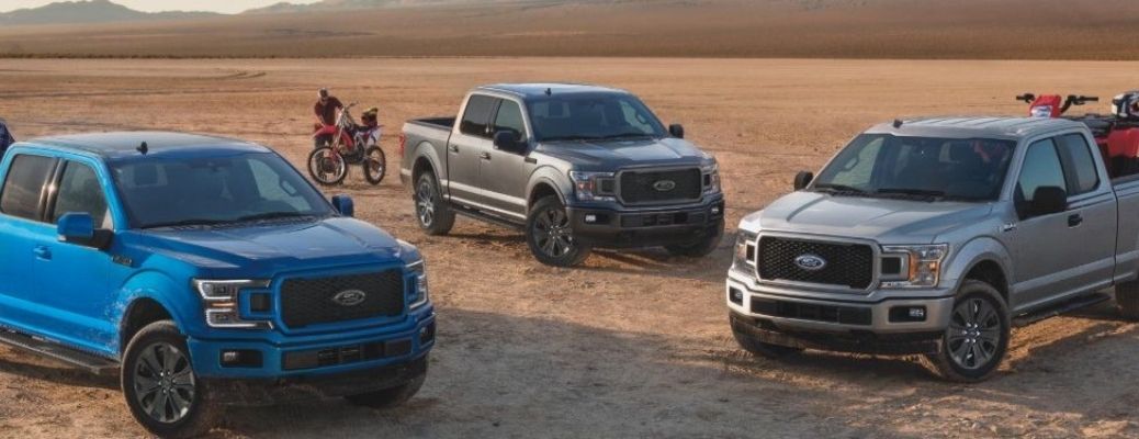Three trucks parked around each other