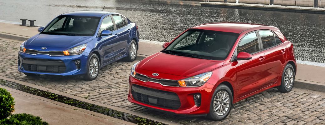 Two 2018 Kia Rio parked side by side