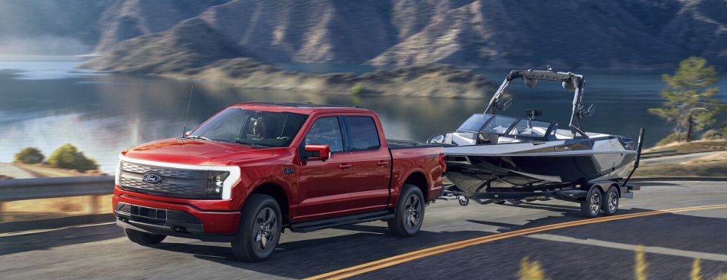 2024 Ford F-150 Lightning towing a boat
