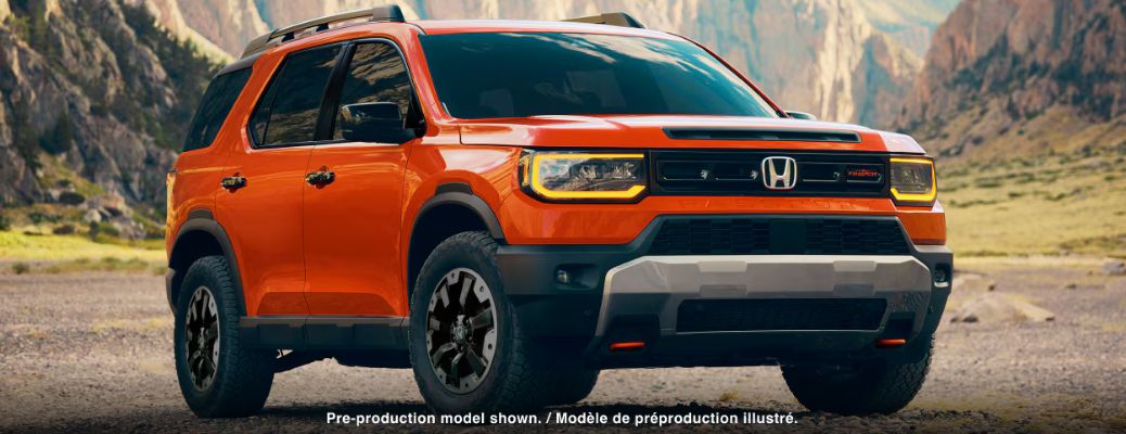 Front-quarter view of the 2026 Honda Passport Orange