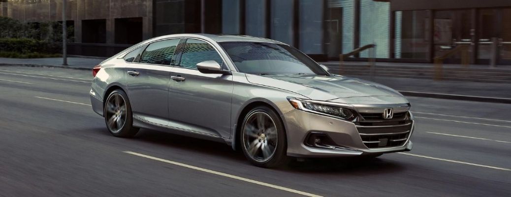 Used 2022 Honda Accord Gray driving on a city road