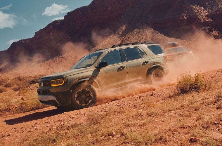 Honda SUV driving downhill