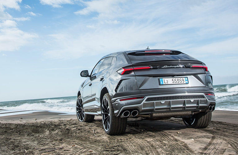 Lamborghini Urus contemplates its long history over an ocean view