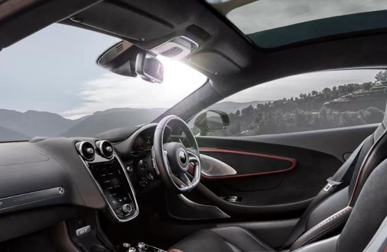 Dashboard interior view of the 2023 McLaren GT driving on road