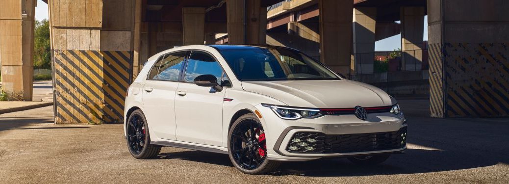 White 2024 Volkswagen Golf GTI 380 Special Edition Front Exterior Under a Bridge