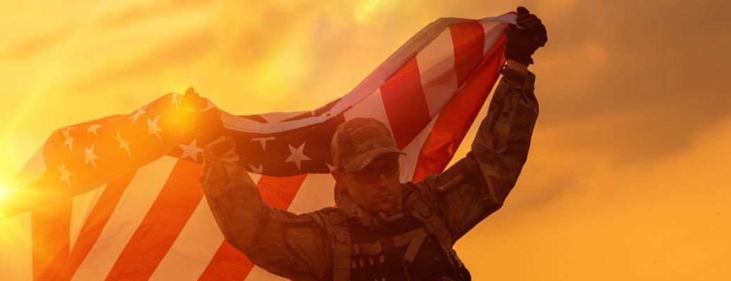 An army man carrying a flag