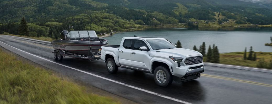 2025 Toyota Tacoma towing a boat