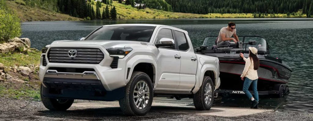 A couple enjoying the towing power and utility of the 2026 Toyota Tundra