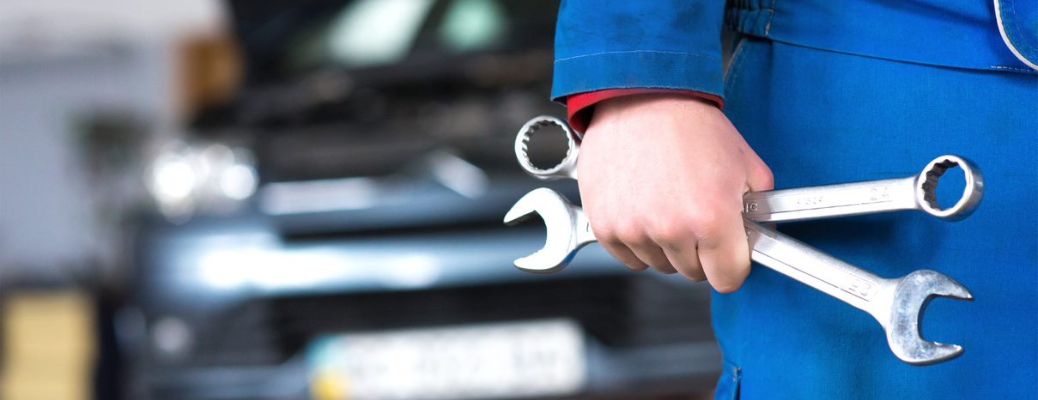 technician's hand with tools