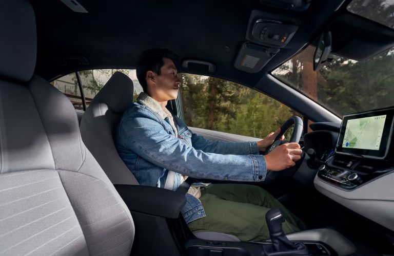 Man driving the 2027 Toyota Corolla