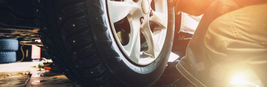 a tire in a car at a service center