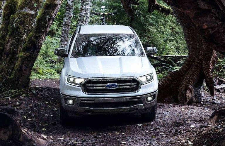 2019 Ford Ranger in red parked on a trail in the woods