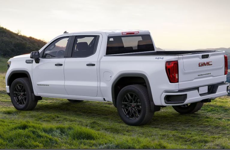 2024 GMC Sierra 1500 parked on a grassland