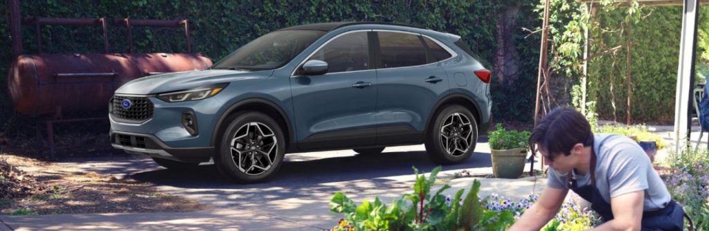 2026 Ford Escape side view parked in a driveway