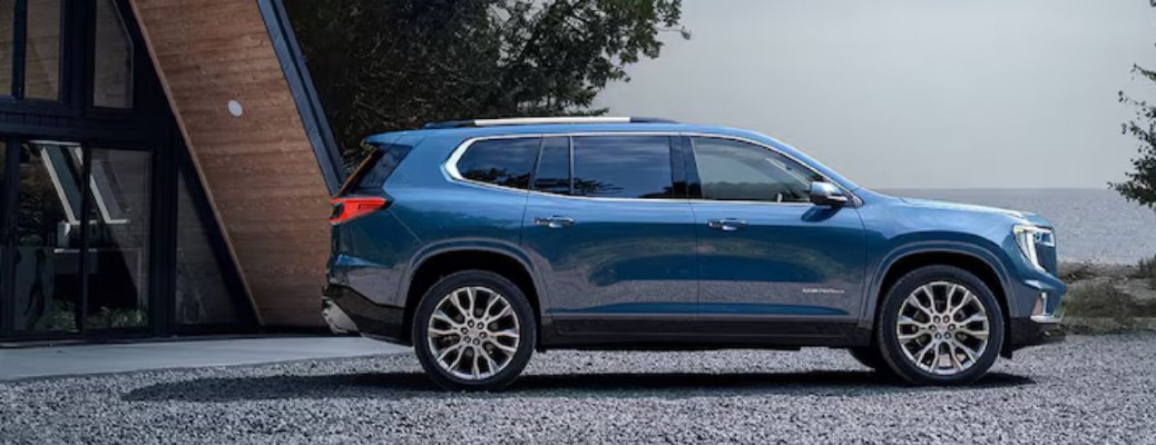 2026 GMC Acadia side view in blue