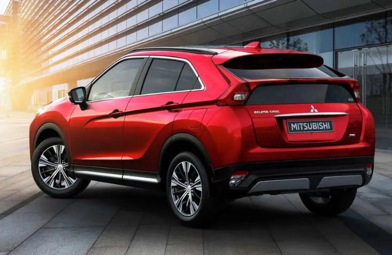  2020 Mitsubishi Eclipse Cross red driving toward shot red with blur