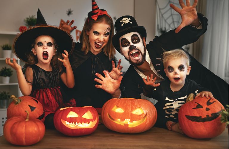 a family in costume on Halloween