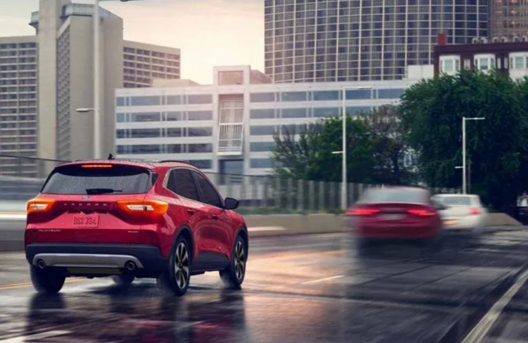 rear view of a Ford on the road