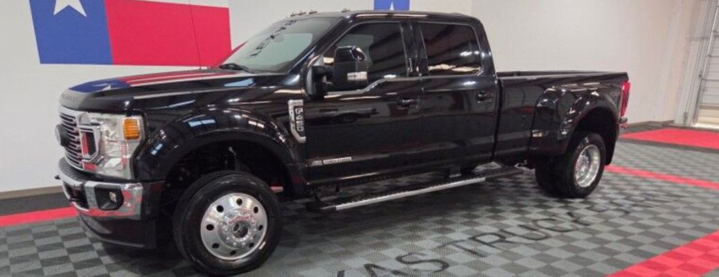 front quarter and side view of a used Ford truck at the dealership
