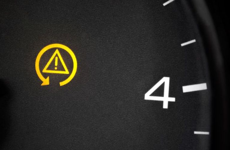 close up of a dashboard warning light