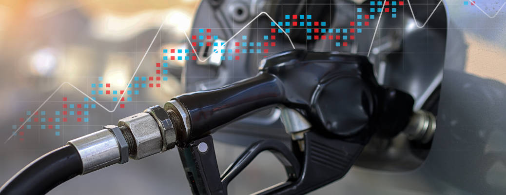 A graph overlaid on a fuel pump as a means of showing rising fuel prices.