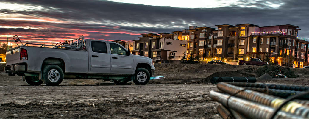 A diesel pickup truck at a construction job site