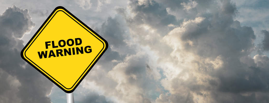 A flood warning sign - a reason why Texas pickup truck drivers should learn how to protect their truck's exterior