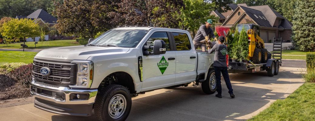 Landscapers towing landscaping material in the Ford Super Duty