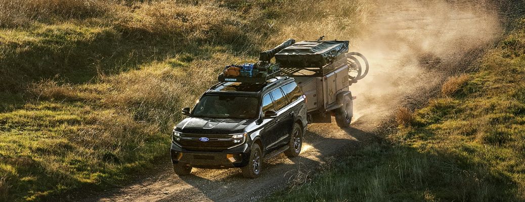 front quarter view of the Ford Expedition towing a trailer