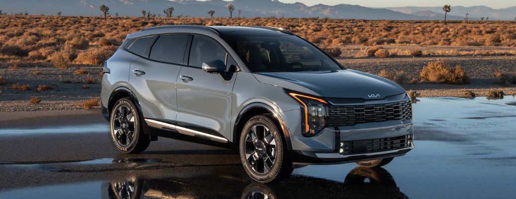 2026 Kia Sportage Hybrid side and front view