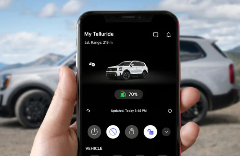 close up of a phone with Kia Access app